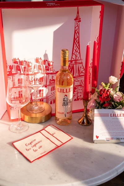 The Lillet x Emily in Paris limited-edition bottles, Lillet Blanc and Lillet Rosé, feature couture-inspired illustrations. Lillet also created two new 'Emily Lillet Royale' cocktail recipes for the collaboration.