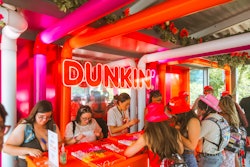 The Dunkin’ House returned to Lollapalooza grounds with a two-story build out produced by Live Nation. Highlights included a bracelet-making station, airbrush tattoos, iced coffee samples, and a second-floor lounge with plush seating areas and views of the festival grounds below. See more: Lollapalooza 2024: 10 Pitch-Perfect Brand Activations From Ulta, T-Mobile, M&M'S, and More