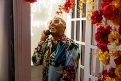 DLUXE Photobooths captured portraits, while a Nostalgic Memoirs audio booth (pictured) and Founder's Original beer pong added interactive elements to the evening. Guests also received soothing massages courtesy of Bodied Beauty.