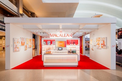 Shopper engagement is a key part of the pop-up journey, with digital touchpoints a central focus. The space combines sensory elements with digital tools, like a nosing tray and a profiling tool called 'Discover Your Expression,' which helps travelers find their favorite Scotch whisky from the Colour Collection. Shoppers can also personalize their purchases with a special gifting option.