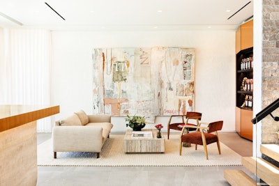 This August, The Macallan Villa opened in LA’s Bel Air neighborhood. In celebration of the Scotch whisky brand's 200th anniversary, the luxury home hosts exclusive events for the brand’s clients, strategic partners, content creators, and more. For the living room space, the brand partnered with graphic designer David Carson to create a piece of art evoking The Macallan Colour Collection. The piece includes symbolic elements such as the chalky white albariza soil essential for sherry vine growth and the venencia used to test maturing sherry.