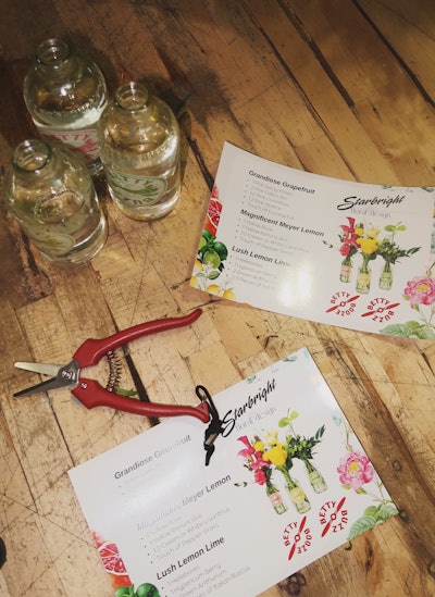 At the private event, flower-making stations were stocked with recipe-style cards that shared the details for making the Betty Blooms arrangements. For example, the “Grandiose Grapefruit” called for one pink spray rose, two calla lilies, one to two lisianthus and statice, plus a “touch of” eucalyptus.