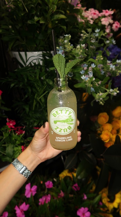 The event also allowed guests to sample drinks from Betty Buzz and Betty Booze. In honor of opening weekend for It Ends With Us, the brand shared specialty cocktail ideas on social media. One such drink is the “Blooming Betty,” which mixes Betty Buzz Sparkling Lemon Lime with tequila, honey, a Tajin rim, and an edible floral garnish.