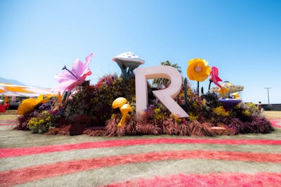Coachella's reputation can be a bit larger than life—so it only makes sense that some of the event design went a bit oversize, too. One fun example? The 20th anniversary of the buzzy Revolve Festival in 2023, which was designed as an otherworldly experience by Blue Revolver and NVE Experience Agency. Oversize florals, mushrooms, and other props complemented a large 'R' logo. See more: Coachella 2023: 40+ Steal-Worthy Event Ideas From the Creativity-Packed Music Festival