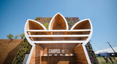 Another fun usage of large-scale logos came from Adidas and Bad Bunny's memorable team-up at Coachella 2023. The Adidas Campus Experience, a cube-shaped pop-up that celebrated the pair’s latest sneaker release, featured a massive Adidas logo made from steel and pine that highlighted a shopping experience. On the other side of the flower-covered cube, Bad Bunny’s signature logo served as an entrance tunnel. The activation was produced by Corso Marketing Group and fabricated by Whalefilm. See more: Coachella 2023: 40+ Steal-Worthy Event Ideas From the Creativity-Packed Music Festival