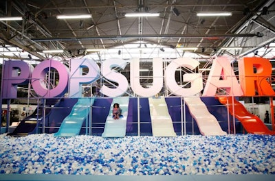 The inaugural PopSugar Play/Ground in 2018 celebrated women with two days of panels, musical performances, shopping, and brand activations. The festival's massive, Instagram-worthy installation displayed the name of the company looming over slides in different colors, which attendees could ride into a giant ball pit. See more: 17 Steal-Worthy Event Ideas From PopSugar's Women's Lifestyle Festival