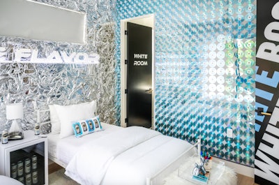Mike's Hard Lemonade took a similar approach. Knowing that several influencers were invited to stay overnight at the house to create sponsored content, the team focused on building a variety of branded and themed backgrounds, as well as interactive moments that encouraged filmed content. Each of the bedrooms was tied to a different look and style, like the white room that had a CD-covered signing wall for guests to leave a message.