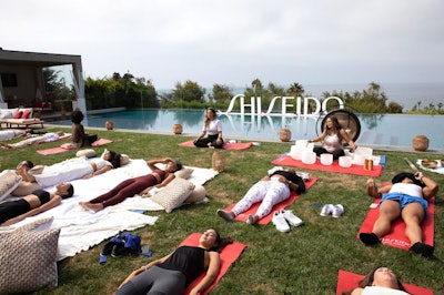 Shiseido's beach house included sound bath meditation, yoga sessions, and spin classes; attendees also ventured off site for a beach cleanup charitable activity.