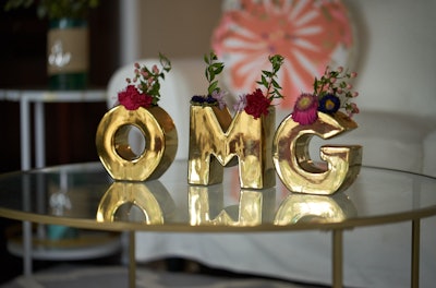 The Awesomeness house was full of playful, Instagram-friendly details, such as flower vases that spelled out the letters 'OMG' and signage with tongue-in-cheek sayings like 'awesome AF' and 'beach please.' In addition to the in-house team, Mirrored Media was in charge of all house operations and creative production, while MS Event Production handled the audiovisual needs.