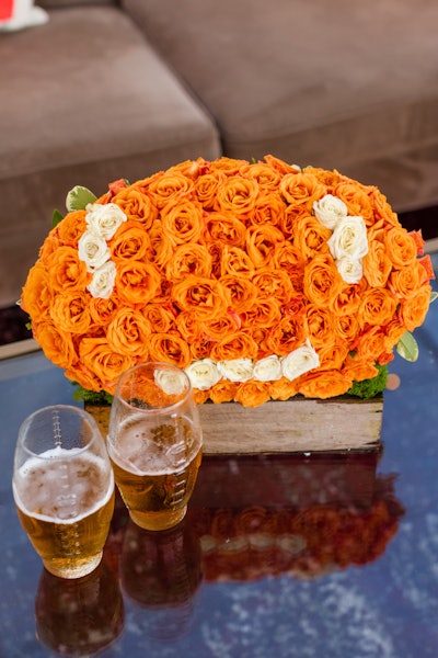 Other stylish twists on football-themed decor popped up throughout the styled shoot, including football-shaped glassware plus florals from White Sakuras. See more: 11 Ideas for an Upscale Super Bowl Party