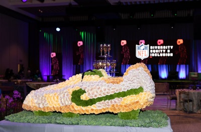 At the NFL's inaugural “A Look Into the Future” breakfast, co-sponsored by PepsiCo., in 2022, there were floral footballs and cleats created by Empty Vase.