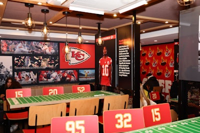For their game against the Miami Dolphins in November 2023 at Deutsche Bank Park in Frankfurt, the Kansas City Chiefs exported Kansas City and Chiefs Kingdom to Germany. It was the franchise's first regular-season game in Germany, as well as the NFL's first game in Frankfurt. Highlights included a custom-wrapped Chiefs-themed boat on the banks of the Main River in central Frankfurt, which served as the central hub of activity and entertainment throughout the team’s stay in Germany, along with a Chiefs-branded Burger King downtown (pictured) that included team photos, branding, and historical facts displayed throughout the restaurant. See more: How the NFL Is Winning Over International Fans