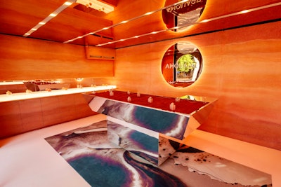 The monthlong pop-up aimed to be a true experience of the beauty found in Oman, from the perforated geographic patterns adorning the exterior to the crimson sand product display of an on-site boutique store.