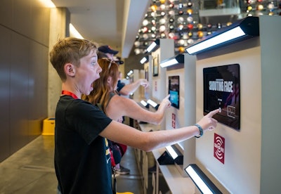 To take part in the AI-powered experience, guests step up to a face scan kiosk, prompting a series of questions about their favorite team, biggest rivals, and dream position.