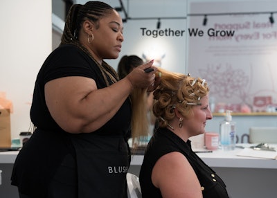 Visitors were treated to pampering services including hairstyling and manicures.