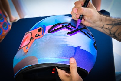 Infiniti hosted a viewing party of the grand prix at the house that included customized helmets.