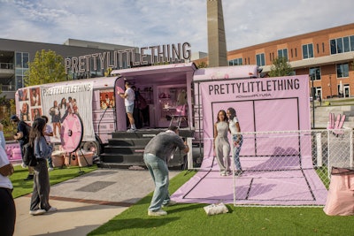 The e-retailer's decked-out school bus is painted a pale pink.