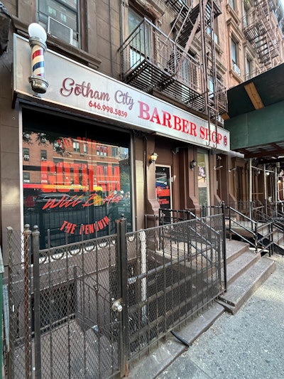 The series transformed the storefronts of Gotham Burger Social Club, Gotham West Market, Gotham City Barber Shop (pictured), and Gotham Wines & Liquors.