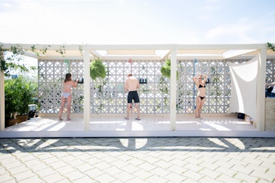 Tinsel Experiential Design built working shower stalls along The Rockaways beachfront in Queens for a client launching a line of new shower gels.