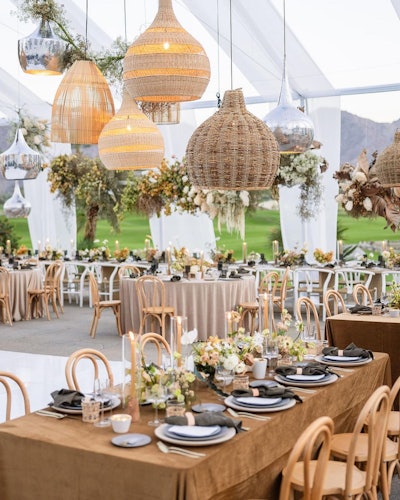 Velluto table linens in Sienna and Oatmeal shades (from $40, depending on size), available globally from Nüage Designs