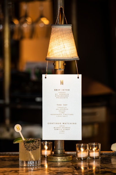Bar menus were printed on Lucite acrylic and suspended on the lanterns around the bar.