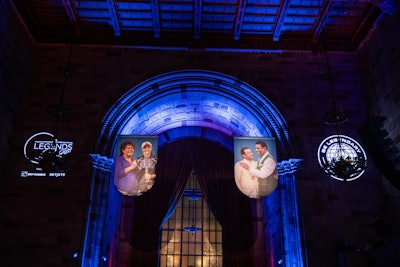 Five massive double-sided banners, shaped as reverse arches to mimic the lines of the room, were suspended from the ceiling. Banners featured photos of tennis greats alongside the next generation.