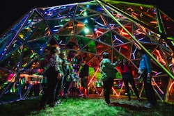 Brand creative agency Organic and installation artist Joel Masters collaborated on “The Dome of Reflection,” an immersive, light-bending communal space featuring dichroic film panels and perspective-shifting lights on a steel geodesic dome.