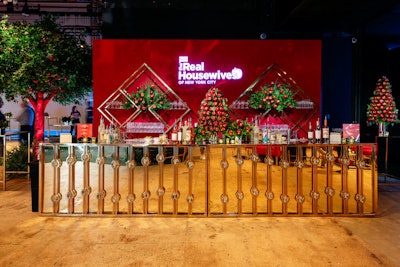Of course, the event wasn't without its challenges. 'Our timeline was very short—we had six hours before the first client walk-through to build and place all the items,' Skonieczny revealed. 'One of the bigger challenges was sourcing incredible trees so that you really felt like you were in an orchard—despite being inside. All of us were thrilled at how it turned out!'