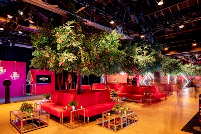 The team aimed to merge the natural beauty of the orchard with the luxurious RHONY aesthetic, incorporating red velvet lounges, gold and mirrored tables, and glamorous bars. 'Lots of people commented how they felt like they were walking into a real orchard and how beautiful the space looked,' Skonieczny said. 'I heard quite a few comments on how it was one of the most incredible transformations they have seen at the Chelsea Factory.'