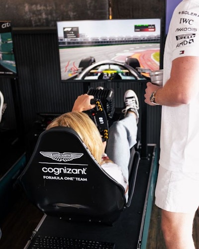 Immersive activities abounded at Club SI and included this racing simulator courtesy of F1 title sponsor Cognizant, which is also the global technology services partner for the Aston Martin Aramco Formula 1 (AMF1) racing team.