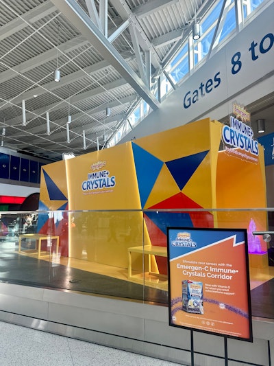 The Emergen-C Immune+ Crystals corridor was strategically located right outside the TSA security checkpoint, presumably after travelers had to discard their liquids, to promote the fact that the new product doesn’t require water to consume. As travelers entered the corridor, they received complimentary Immune+ Crystals samples.