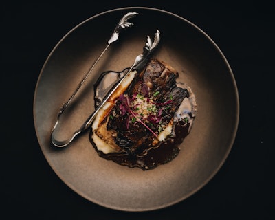 In a fun twist, each dish was served with what Hardaway calls “unsettling tools” to use to enjoy it. “Using these instruments to shred, scoop, or spear was all part of leaning into the narrative of the show and the nature of the horror audiences would encounter,” she explained.