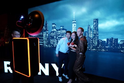In another space, guests stood in front of an illuminated city backdrop. They were captured in video and were able to select their favorite RHONY catchphrase that was shared via the overlay.
