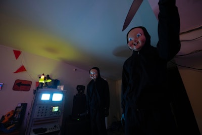 The Bayfield Babyface Killer, the main antagonist of the Happy Death Day franchise, makes an appearance during the experience.