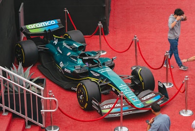 Race cars on display proved to be the perfect photo op for Club SI attendees.