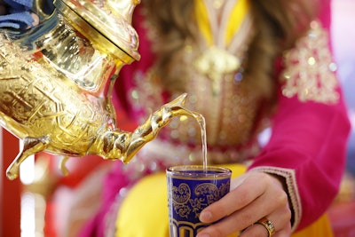 The booth for the Moroccan National Tourism Office featured traditional tea preparation.