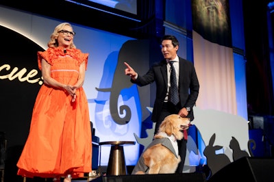 In another fun moment, Amy Sedaris hosted a new segment called 'Best Dressed Pet' where guests submitted photos of their pets in various costumes for her to decide who would be bestowed the honor of looking the most dashing. The event also featured performances from Brittany Moore and Mya. For the stage design, Eventique opted for printed banners and sheer fabrics to create a sense of height in the space while keeping the design lightweight. 'The layered sheers served a dual purpose: Front lighting added textured visuals when desired, while backlighting revealed the venue's ornate architecture behind them, adding depth,' explained Eventique production designer Taylor Jurell. 'To enhance the stage further, animal silhouettes wove between the banners and scrims, amplifying the dimensionality. A center upstage wall featuring the event name and LED neon trim added a bold, focal element to tie it all together.'
