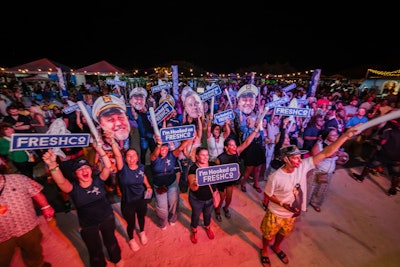 Chefs handed out signs, props, and stickers to the crowd in an effort to land votes.