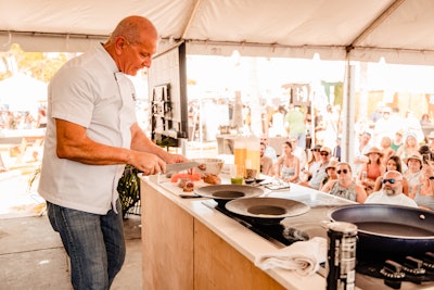Celebrity chef, personality, and this year’s festival host Robert Irvine treated Saturday Seafood Slam guests to a seared tuna demo at the Milam’s Markets Culinary Showcase Kitchen.