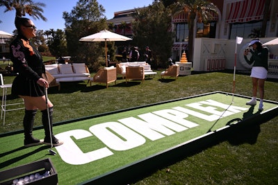 A branded putting green allowed players to practice their stroke or pose for photos.