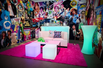 The walls of the venue were plastered with imagery from the decade such as photos of Prince, Garbage Pail Kids, and Alf.