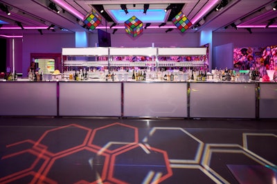 The main bar featured custom chandeliers from Ed Libby & Company Events that were designed to look like Rubik's Cubes, with the City Harvest heart logo in the middle.