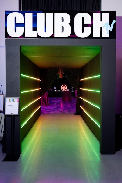 The entrance to the VIP area was a tunnel with neon lighting topped with a Club CHTV sign.