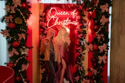 Attendees can pose for photos with a life-size cutout of Carey at each location.