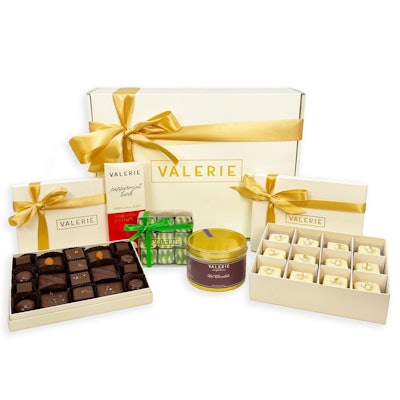 Los Angeles-based Valerie Confections’ Extravagant Winter Gift Set ($195) contains Eggnog Petits Fours, Evergreen Truffles, Peppermint Bark Bar, the Baby Grand assortment (a selection of toffees, truffles, and caramels), and a golden tin of hot chocolate.