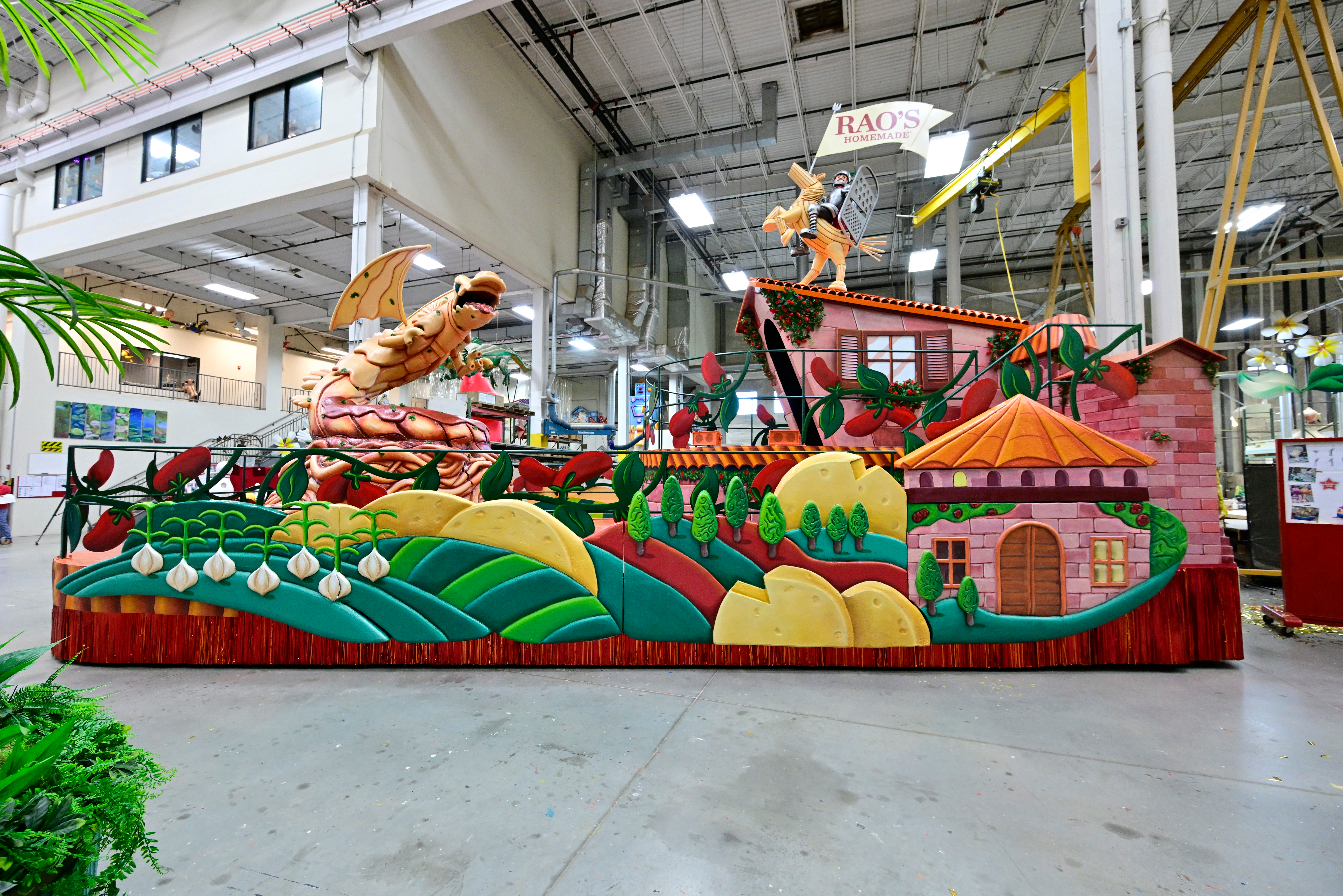 The &ldquo;Pasta Knight&rdquo; float concept will feature a knight in shining armor and a fire-breathing dragon (with, yes, real fire), complete with a medieval backdrop laced with pasta and sauce accents.