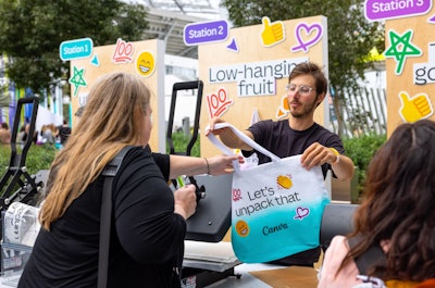 'The DIY Swag Shop offered custom gradient tote bags, in a rainbow of Canva colors, for guests to take home,' said Blasko. 'After selecting a bag color, they were invited to pick from a huge selection of patches—re-creations of iconic Canva interface elements—that were then pressed onto their totes. These completely custom and sustainable giveaways were a huge hit!'