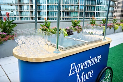 “Design-wise, we pushed boundaries with a gradient we applied throughout the space,” said Elliot. “Curved structures are challenging in trade shows, but with one of our systems, we added curvature to stages, back walls, and kiosks. That really elevated the design.”