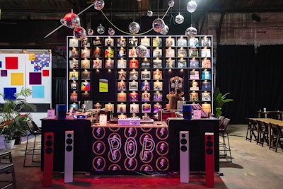 This included a bookstore, a vinyl bar where attendees could don headphones and listen to their favorite records, a TED photo booth, a meditation space, a restore lounge, communal workspaces, a snack bar, and a beer and gaming area complete with darts, air hockey, basketball arcade games, and a pool table.