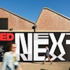 Unlike traditional TED conferences that often focus on broad societal issues and innovations, TEDNext was created to emphasize individual aspirations and personal development.
